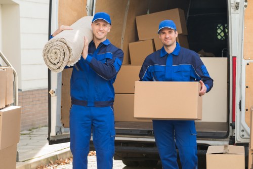 Professional house removals in Watford with moving boxes and furniture
